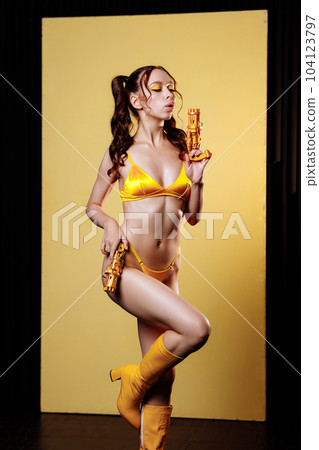 Front view happy young sexy woman in yellow swimsuit Front view happy young sexy woman in yellow swimsuit 104123797