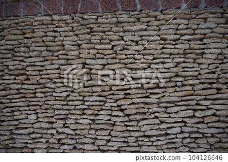 texture torn wall with stones 104126646