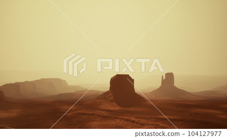 Sunset at the sisters in Monument Valley Sunset at the sisters in Monument Valley 104127977