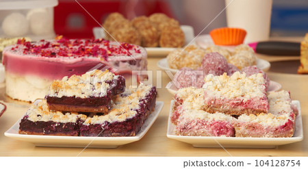 Tasty desserts at the bakery stand at the farmers street food market in Prague Tasty desserts at the bakery stand at the farmers street food market in Prague 104128754