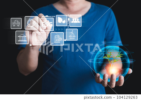 hand touch hologram to save energy,and reduce global warming,climate change,ecology friendly investment,ESG environment social governance,Green Business Innovation and Sustainable Development concept. 104129263