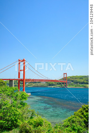 Hirado Bridge seen from Hirado Island in spring, Hirado City, Nagasaki Prefecture 104129448
