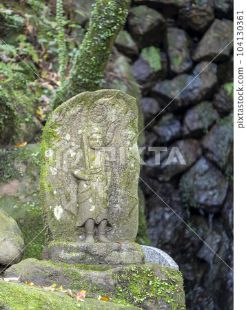 A stone statue of Fudo Myoo enshrined in a shrine A stone statue of Fudo Myoo enshrined in a shrine 104130361
