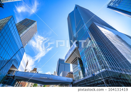 Tokyo cityscape in Japan Toranomon Hills Station Tower Toranomon Hills Station. Tokyo Tower in the back 104131419