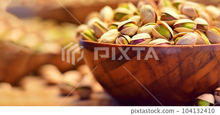 Delicious pistachios on a plate, healthy food concept, for farmers' market displays Delicious pistachios on a plate, healthy food concept, for farmers' market displays 104132410
