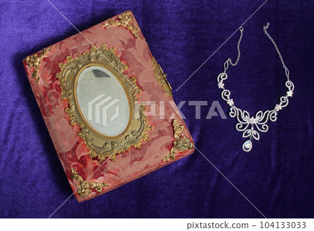 Crystal Rhinestone Jewelry on Antique Book With Mirror Crystal Rhinestone Jewelry on Antique Book With Mirror 104133033