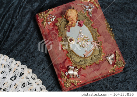 Antique Book With Colorful Gemstones. Fairy Tale Romance Book Antique Book With Colorful Gemstones. Fairy Tale Romance Book 104133036