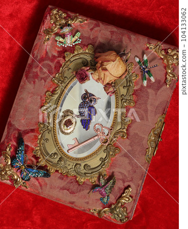 Antique Book With Colorful Gemstones and Mirror. Fairy Tale Romance Book 104133062