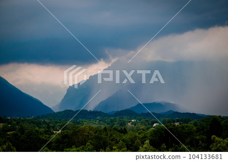 Dark clouds and rain over mountains in Dolomites, Italy Dark clouds and rain over mountains in Dolomites, Italy 104133681