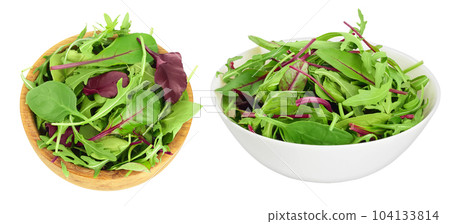 Mix salad - arugula, spinach and chard in wooden bowl isolated on white background. Top view. Flat lay 104133814