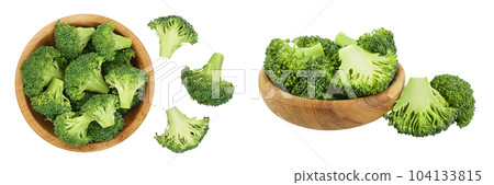 fresh broccoli in wooden bowl isolated on white background close-up with full depth of field. Top view. Flat lay fresh broccoli in wooden bowl isolated on white background close-up with full depth of field. Top view. Flat lay 104133815