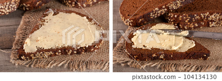 slices of black bread with sesame seeds and butter on the old wooden background 104134130