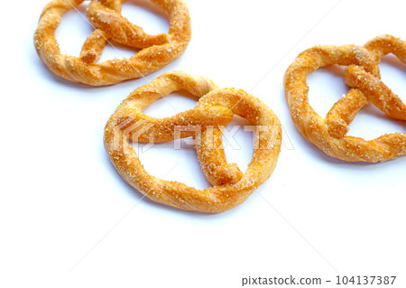 Soft pretzels on a white background. 104137387