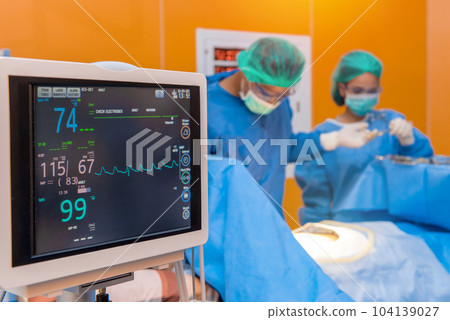 Defibrillator with Medical physician doctor or Surgery team in ICU operation room  at hospital 104139027