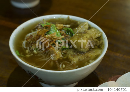 Top view of a bowl of soto seger or beef soup from Boyolali, Indonesia. 104140701