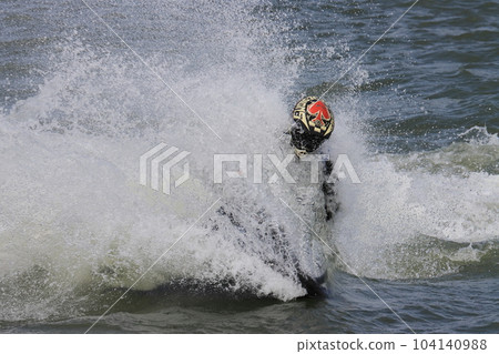 Jet ski that makes a splash and turns marine sports Jet ski that makes a splash and turns marine sports 104140988
