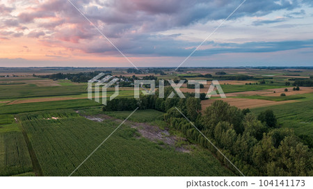 Sunset aerial landscape of filds and meadows 104141173