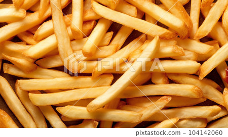 French fries with ketchup, fast food concept, unhealthy food French fries with ketchup, fast food concept, unhealthy food 104142060