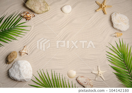 Sea sand with starfish and seashells 104142180