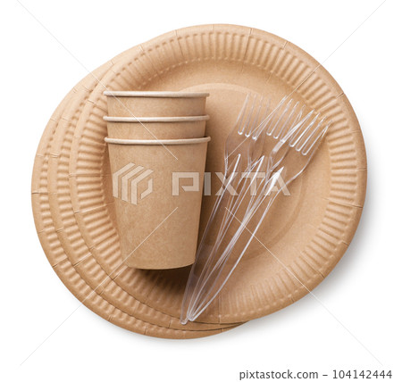 Disposable tableware. Plates, cups and forks on a white background. Top view 104142444