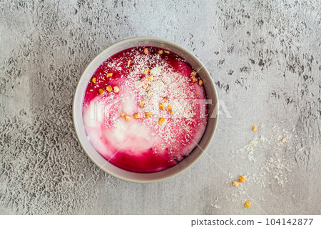 Malabi - traditional Arabic dessert. Milk pudding with rose syrup and nuts. Malabi - traditional Arabic dessert. Milk pudding with rose syrup and nuts. 104142877