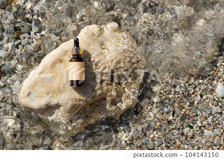 Natural moisturizer product idea at the beach. Natural moisturizer product idea at the beach. 104143150