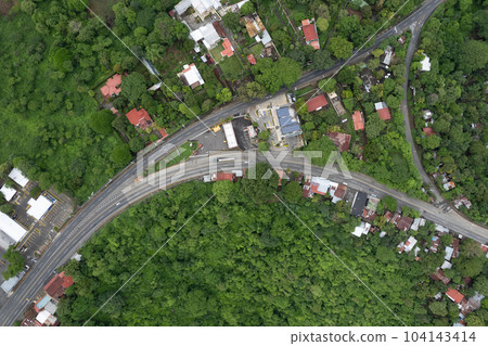 Road intersection in green nature background Road intersection in green nature background 104143414
