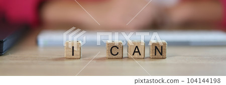 Business woman word I can from cubes in office 104144198