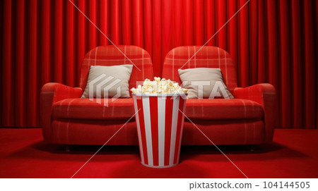 red sofa and popcorn in the home theater 104144505
