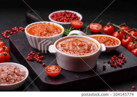 Delicious spicy tomato sauce with pepper, garlic, salt, spices and herbs 104145774