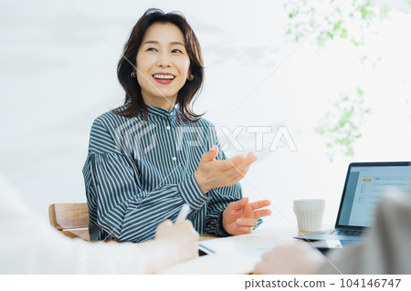 Female in her 50s business scene 104146747