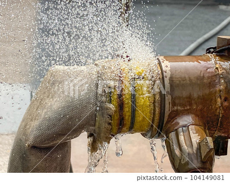 Water leaking at the joints of canvas hose pipe. 104149081