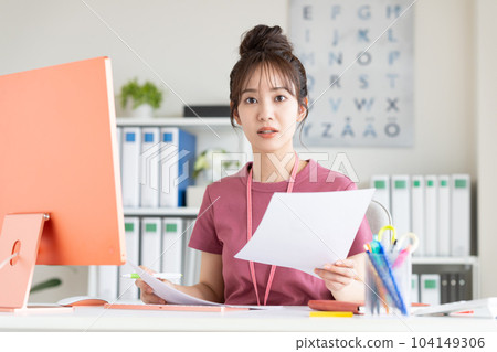 Young engineer woman working in the office 104149306