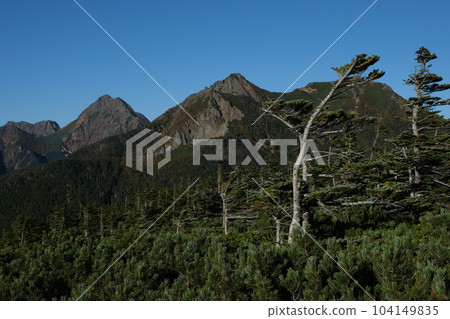 A spectacular trail of Yatsugatake. The magnificent nature of Japan. 100 famous mountains, Mt. Aka. 104149835