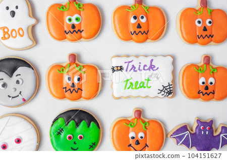 Halloween funny Cookies set on white background. Trick or Threat, Happy Halloween, Hello October, fall autumn, Festive, party and holiday concept 104151627