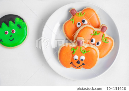 Happy Halloween with funny Cookies; Pumpkin, scary ghost, spooky mummy, bat, frankenstein, dracula and spider. Trick or Threat, Hello October, fall autumn, Traditional, party and holiday concept 104151628