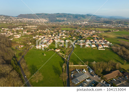 Aerial view of residential houses in green suburban rural area Aerial view of residential houses in green suburban rural area 104153004