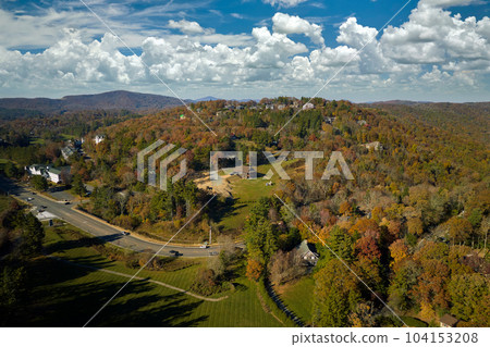 Aerial view of expensive american homes on hilltop in North Carolina mountains residential area. New family houses as example of real estate development in USA suburbs 104153208