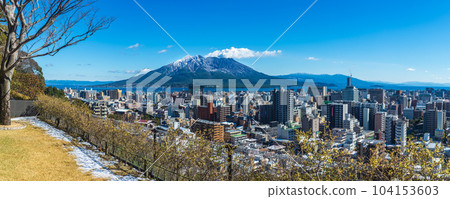 Snow-capped Sakurajima floating in Kinko Bay and Kagoshima City Snow-capped Sakurajima floating in Kinko Bay and Kagoshima City 104153603