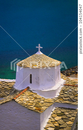 Church tower on Skopelos Island in Greece with copy-space Church tower on Skopelos Island in Greece with copy-space 104154047
