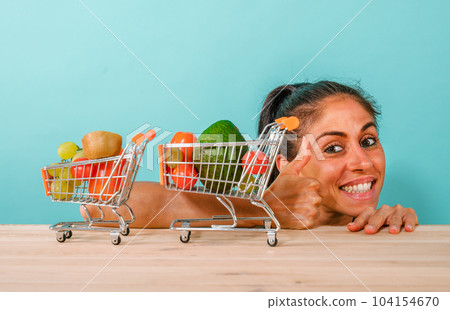 Happy woman made an healthy shopping of fruit 104154670