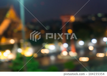 Abstract blurred bokeh city at night with sky and road light 104155354