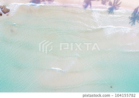 Aerial view azure sea water white sand beach with coconut shadow 104155782