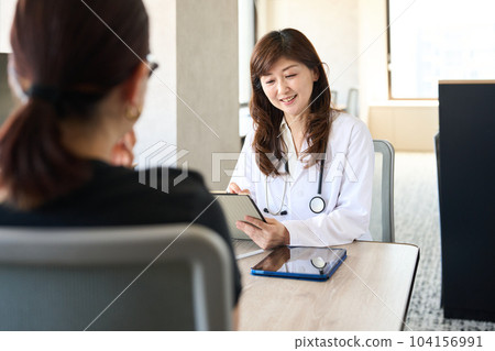 Doctor under examination 104156991
