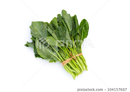 Collard greens on white background. 104157687