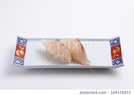 Two pieces of amberjack nigiri sushi 104158855