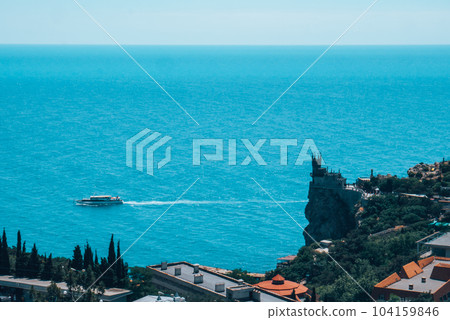 Castle of Swallow's Nest at the Black Sea coast, Crimea. Castle of Swallow's Nest at the Black Sea coast, Crimea. 104159846