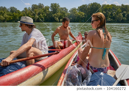 Canoeing on a river, girl in the boat Canoeing on a river, girl in the boat 104160272