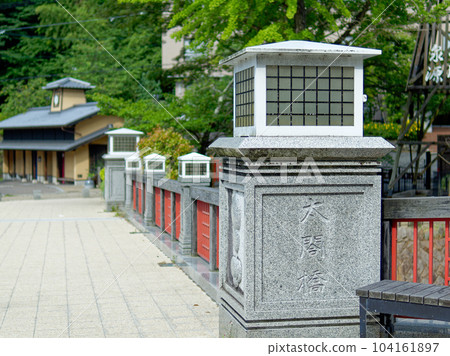 Arima Onsen, Taiko Bridge over Arima River (blurred background) Arima Onsen, Taiko Bridge over Arima River (blurred background) 104161897