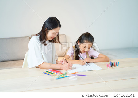 Parents and children playing and drawing in the room Parents and children playing and drawing in the room 104162141